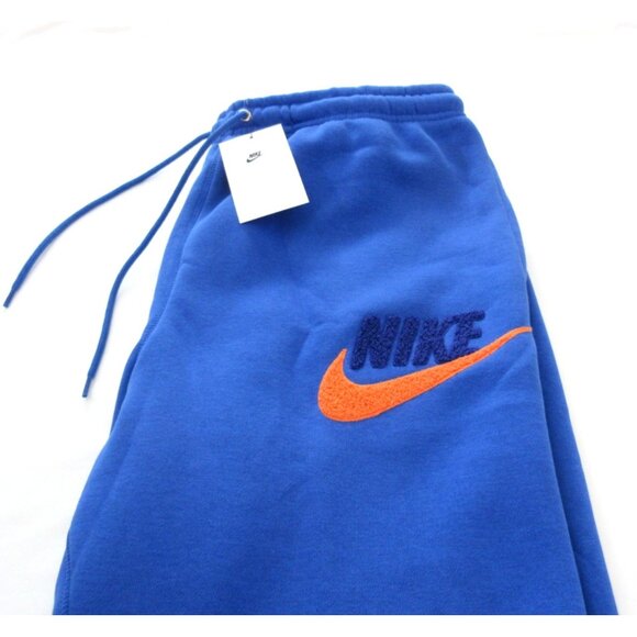 Nike Club Men's Tapered Leg Fleece Lined Jogger pants Royal Blue Orange NWT - Picture 8 of 8